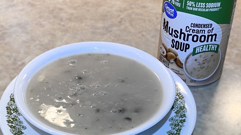 Great value heart healthy cream of mushroom soup in bowl next to can