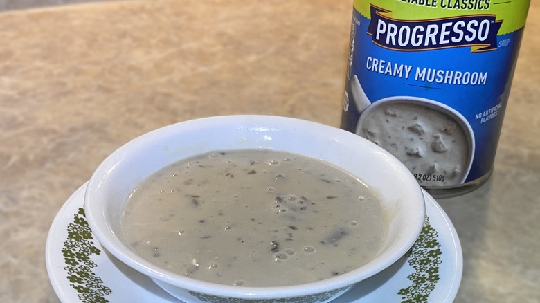 Progresso Creamy Mushroom Soup in bowl next to can