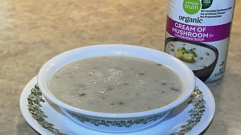 Simple Truth Organic Cream of Mushroom Condensed Soup in bowl next to can