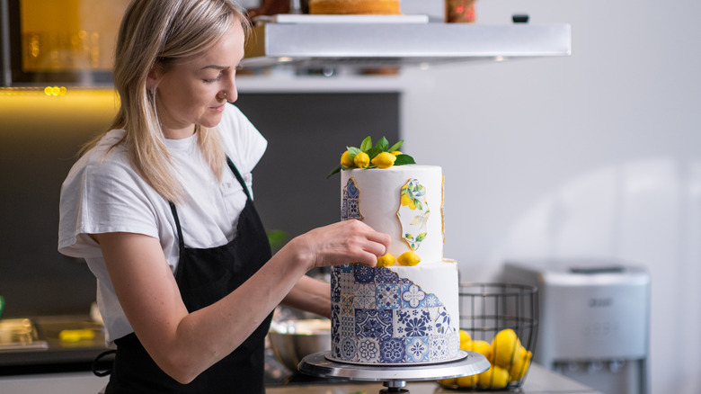 Woman making custom cake