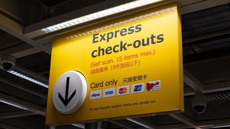 An express checkout lane sign at a grocery store