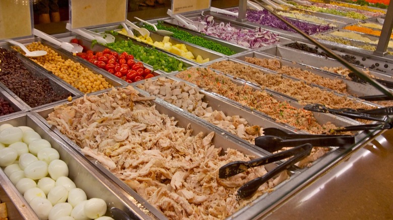 Whole Foods salad bar with chicken eggs, and veggies