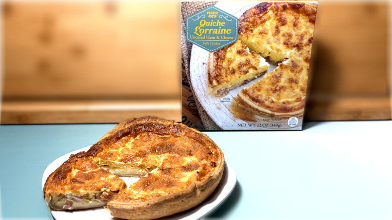 plated quiche lorraine in front of product package