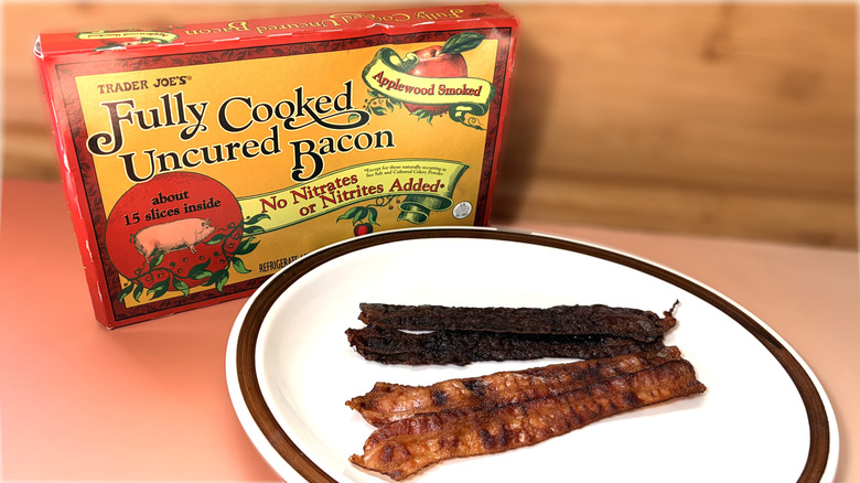 slices of cooked bacon on plate in front of product package