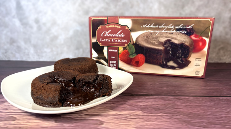 Plate of chocolate lava cakes on a table next to the box package