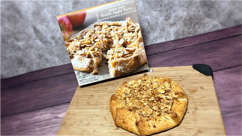 Apple tart on a cutting board with the package behind it