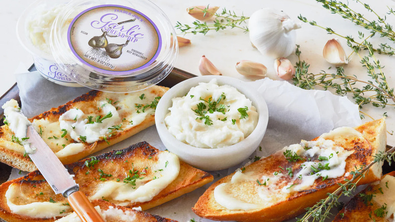 Trader Joe's garlic spread dip on toasts with rosemary