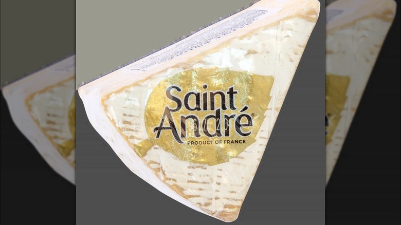 Saint André Triple Crème Brie on a grey background