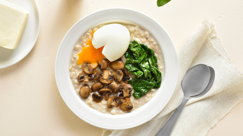 Savory oatmeal, with spinach, mushrooms, and an egg