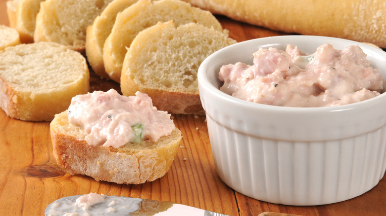 Deviled ham dip with small pieces of bread