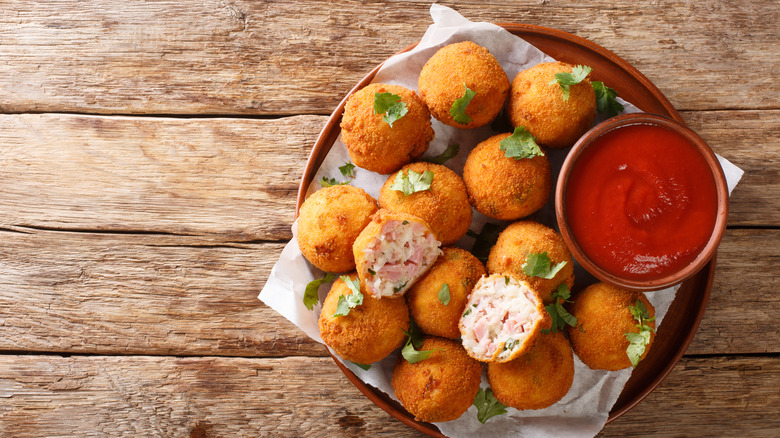 Deep-fried sausage balls with ketchup