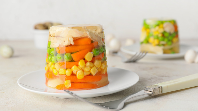 Salad ingredients encased in Jell-O