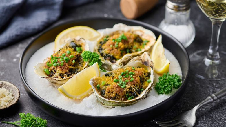 Oysters Rockefeller with lemon slices