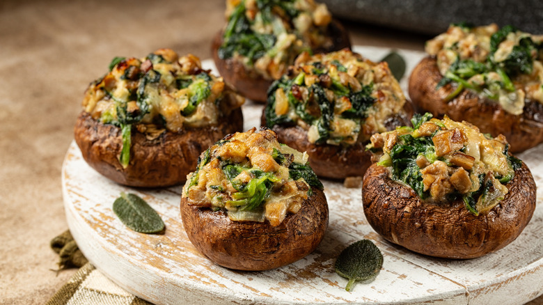 Stuffed mushrooms on a serving board