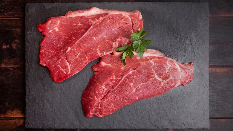 Raw minute steaks