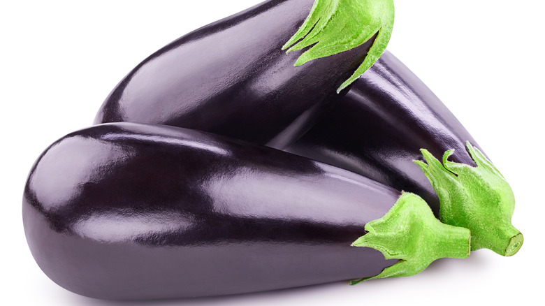 three eggplant on a white background