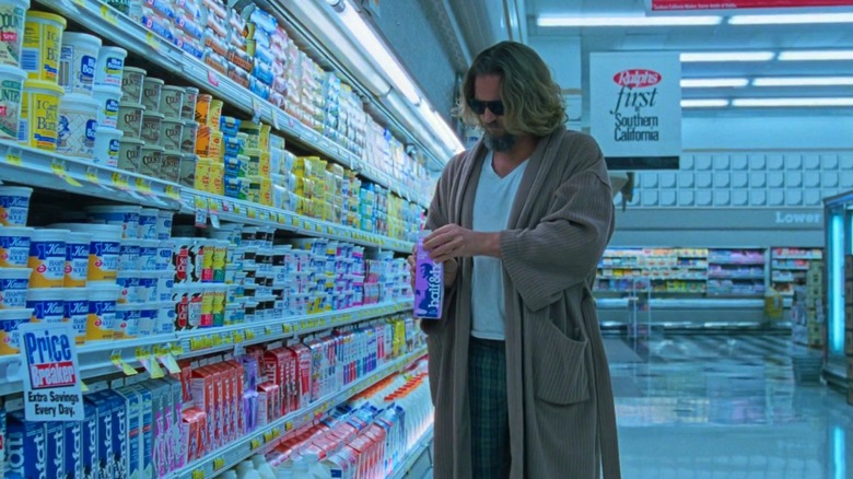 Jeff Bridges with half & half bottle in supermarket
