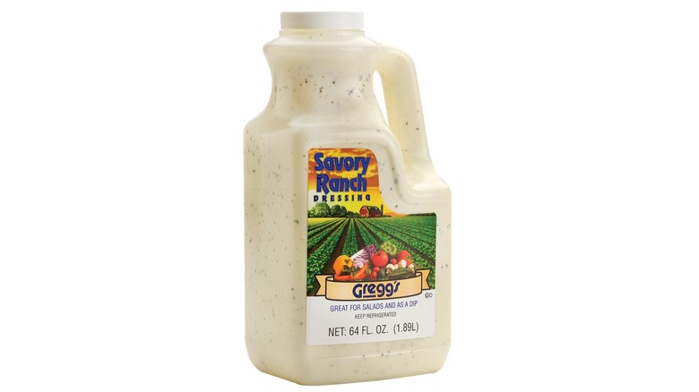 A half-gallon bottle of Costco Gregg's Savory Ranch Dressing on a white background