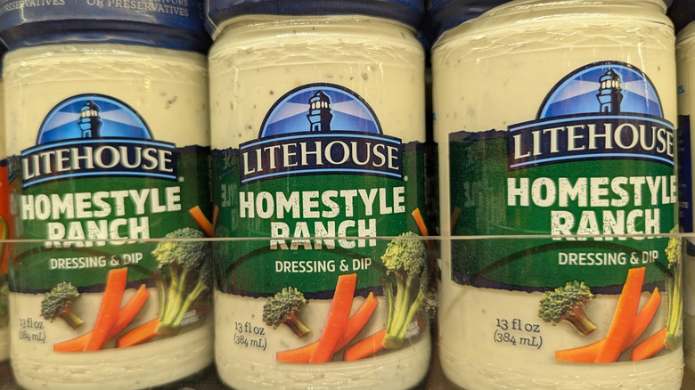 A close-up of Litehouse Homestyle Ranch bottles on a refridgerated grocery shelf