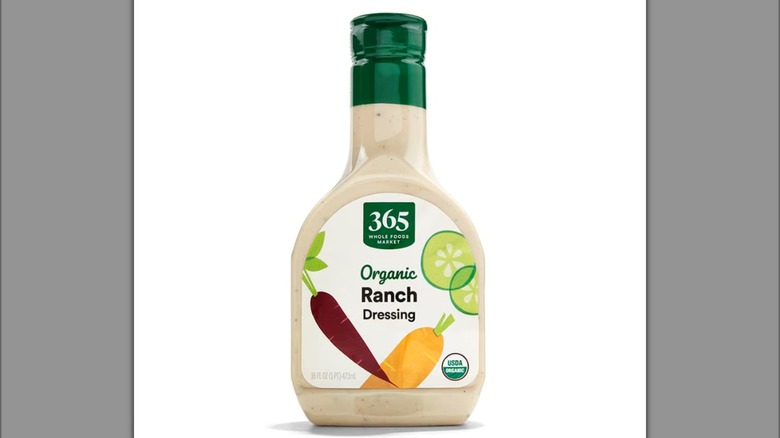 A bottle of Whole Foods 365 Organic Ranch on a white background