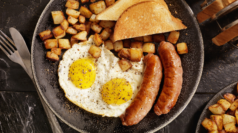 Sausages on breakfast plate