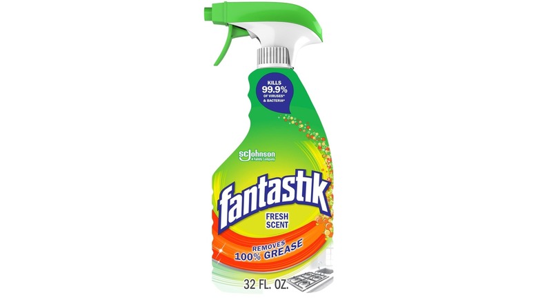Bottle of fresh scent Fantastik All Purpose Cleaner with a multi-colored label and white background