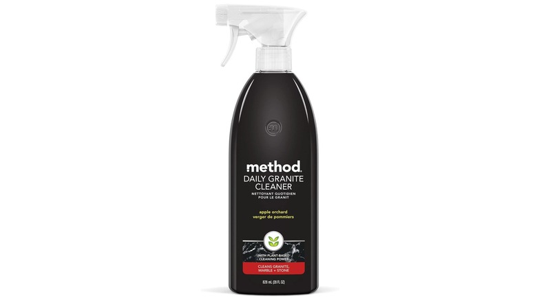 method Daily Granite Cleaner Spray in apple orchard scent in black bottle with white background