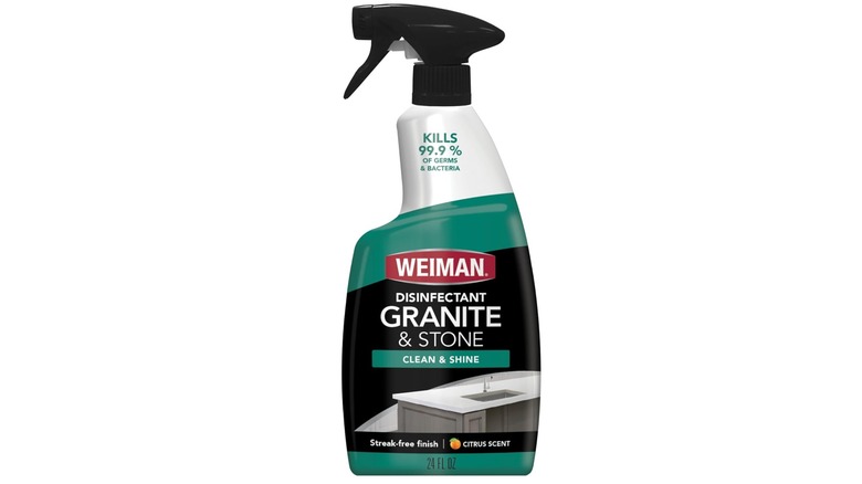 Weiman Disinfectant spray bottle with green label against a white background