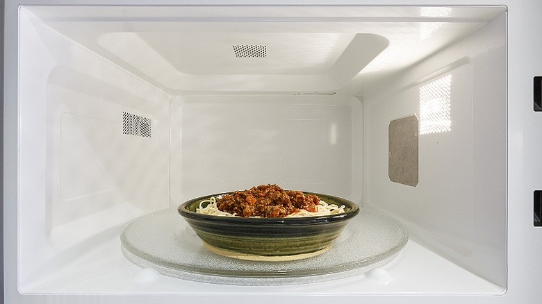 a bowl of food in the microwave