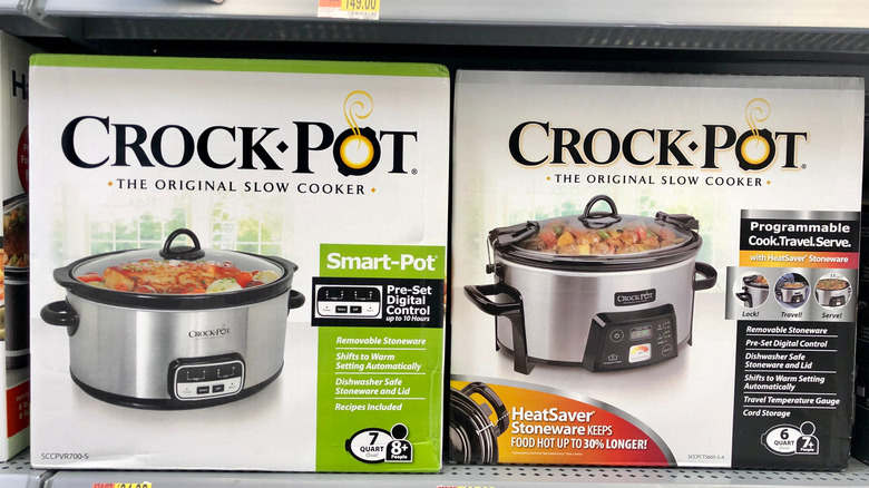Two Crock-Pot slow cooker boxes on a shelf at a store