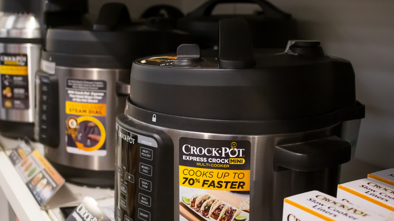 Crockpot express cookers on shelf
