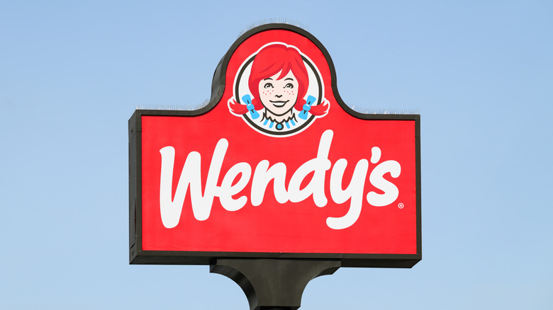 The Wendy's logo is displayed outside a restaurant.