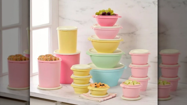 Tupperware set pieces with food stacked