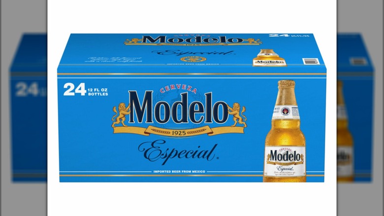 A blue cardboard box of 24 Modelo Especial bottles