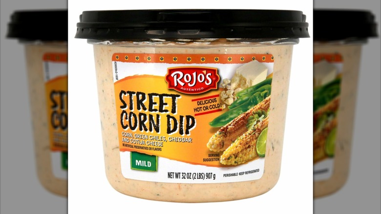 A clear container of Rojo's Street Corn Dip
