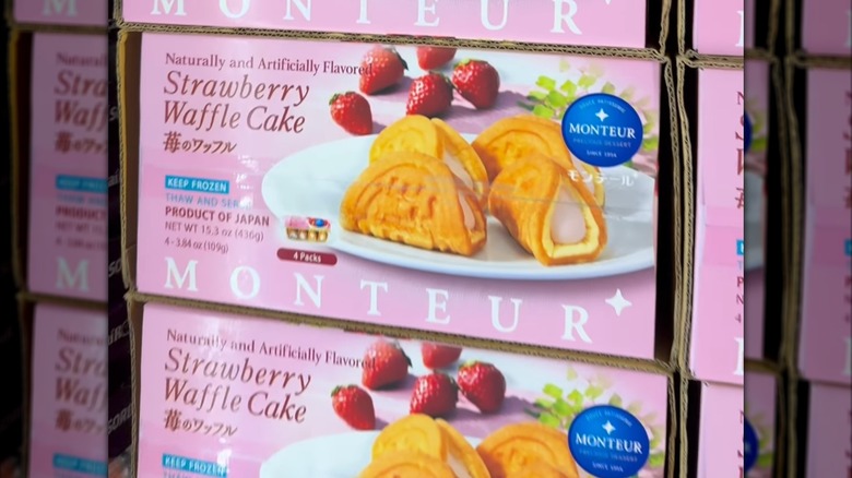 A pink box of Monteur Strawberry Waffle Cakes in a Costco freezer