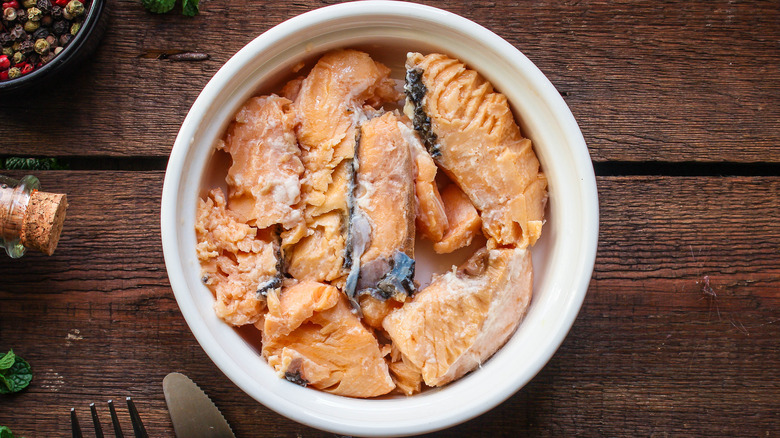 Canned salmon in white bowl