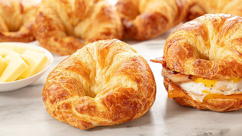 Sam's Club croissants next to pats of butter in a white bowl