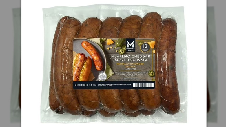 Chopped smoked sausage with cheddar cheese and jalapeño in a package