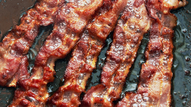 bacon cooking in pan