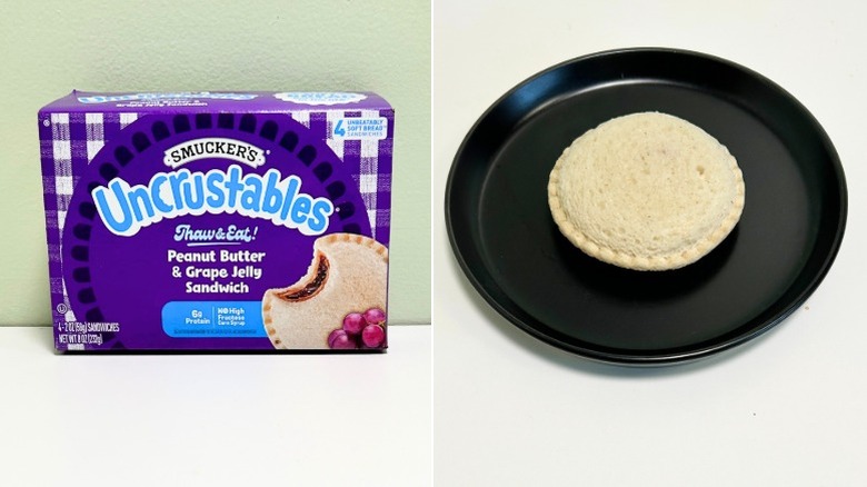 A box of Uncrustables Peanut Butter and Grape Jelly Sandwiches next to a PB&J sandwich on a black plate