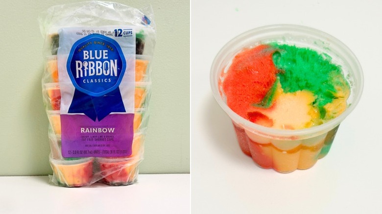 A bag of Blue Ribbon Classics Rainbow Sherbet next to a cup of rainbow sherbet