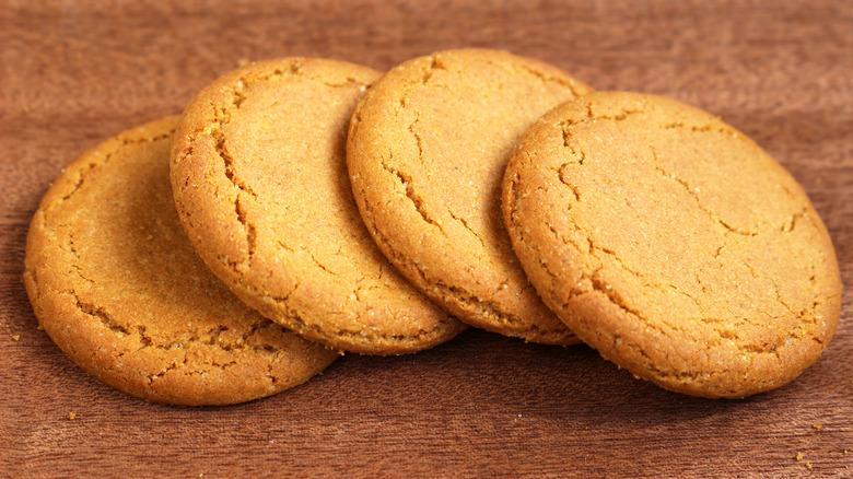 Four ginger snap cookies