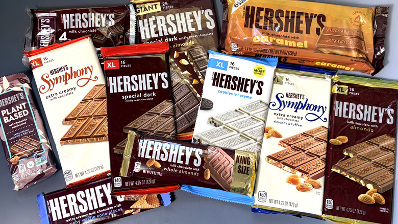 variety of hershey's chocolate bars piled together