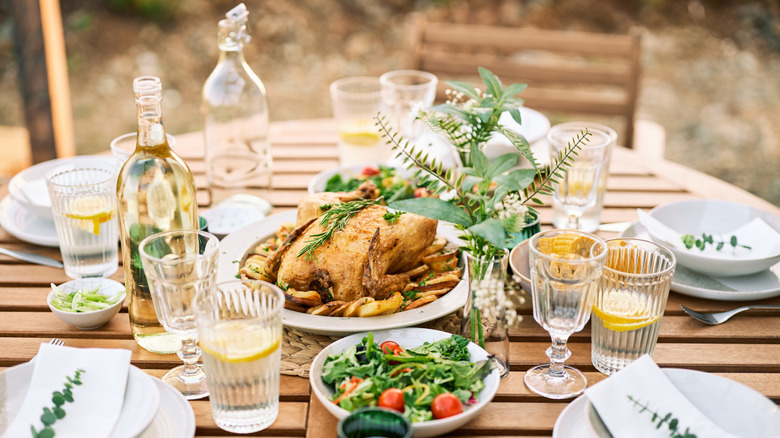 Generic outdoor table with food and drinks