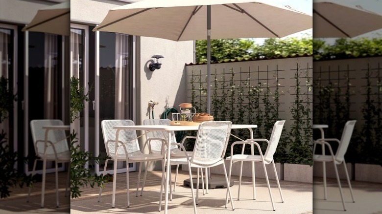 TORPARO foldable white table set under umbrella
