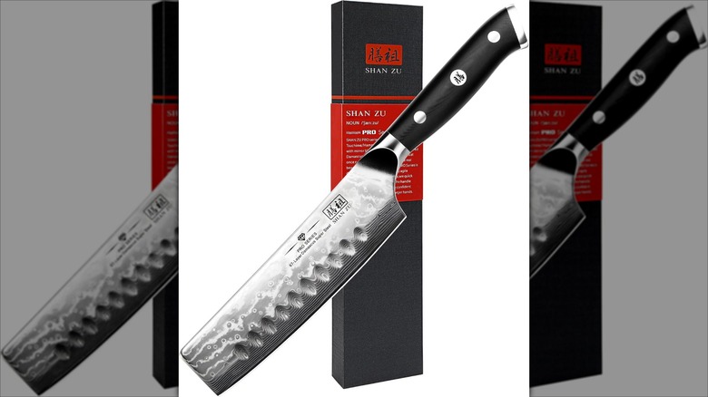 SHAN ZU nakiri knife with a red and black box against a white background.