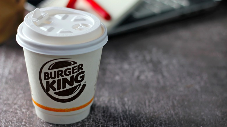Burger King's Whopper unwrapped and placed on a tray