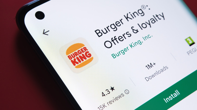 Burger King app page with offers and loyalty displayed on a phone screen