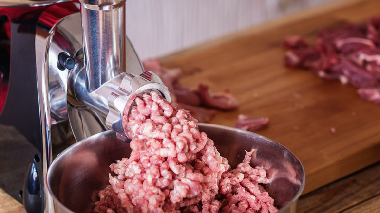 meat grinder in action